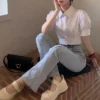 ee87046ab1c9062d58f72283c679ee86.webp Korean style womens bubble sleeve white blouse short sleeve short style