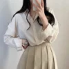 sg-11134201-7qvfa-ljl4e11ayfwld6.webp Korean womens striped blouse long sleeve loose short fold collar