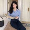sg-11134201-7rcd5-lttmdxvqaiiud5.webp Korean style womens colormatching striped shirt with long sleeve polo collar
