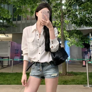 sg-11134201-7rdw6-lxzdmbal4ig657.webp Korean style womens temperament white loose shirt long sleeve folding collar breathable sun protection